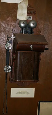 telephone desk: a very small desk for writing notes while speaking on the telephone, and in some cases to support...