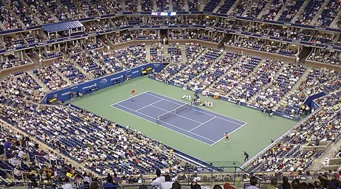 tennis court: a firm, rectangular surface, marked with lines and having a net across the middle, where the game...