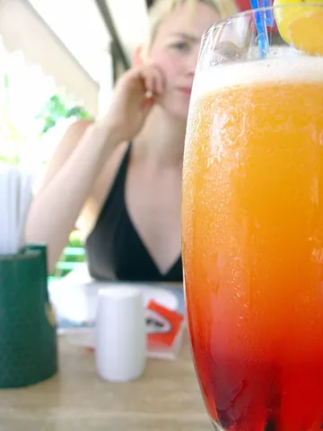 tequila sunrise: a cocktail made with tequila, crème de cassis, lime juice, and soda water