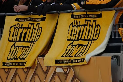 terrible towel: a golden-yellow rally towel with the words "Terrible Towel" emblazoned on it; created by Pittsburgh...