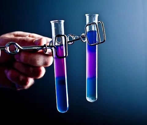 test tube: a glass tube, rounded at one end and open at the other, used for small-scale laboratory tests