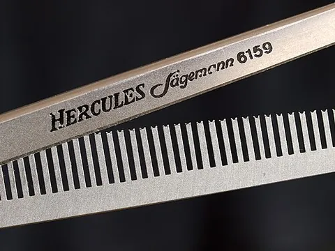 texturizing shears: a type of shears used in hairstyling. One edge is serrated, like a hair comb