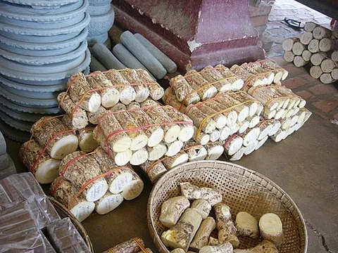 thanakha: a yellowish-white cosmetic paste made from ground wood apple tree bark, worn mainly by Burmese women