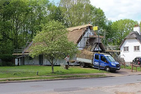 thatching: bundles of hay or straw used to make a roof