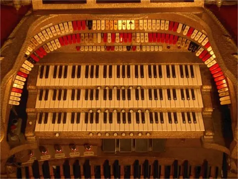 theatre organ: a large pipe organ, usually also containing percussion and sound effect elements, of the style...