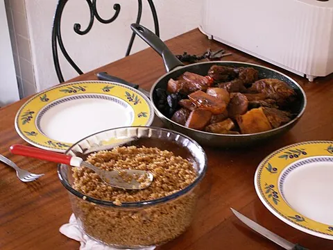 thieboudienne: a traditional dish from Senegal, consisting of fish and rice with tomato sauce