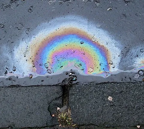 thin-film interference: the interference of light caused by its reflection from both boundaries of a thin film of a...