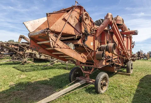 thresher: anything or anyone that threshes