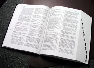 thumb index: a series of alphabetically marked or otherwise labelled semicircular cut-outs in the fore edge of a...