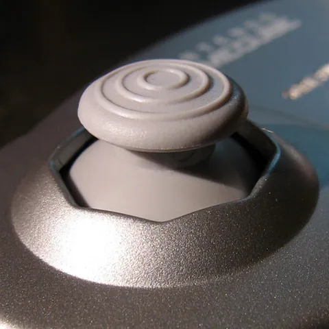 thumbstick: a small joystick, generally part of a larger game controller, that can be operated with the thumb