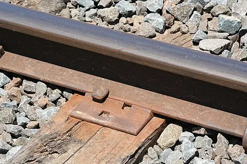 tie plate: a steel plate used on rail tracks between flanged T rail and the crossties
