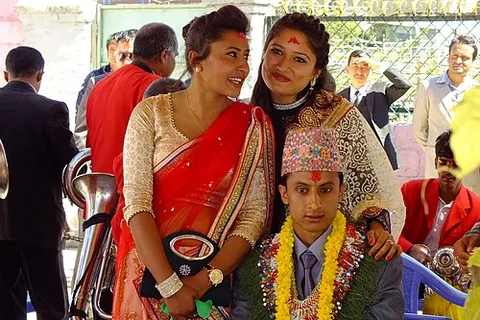 tilak: a mark or symbol worn on the forehead by Hindus, ornamentally or as an indication of status