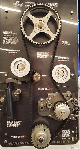 timing belt: a belt (specifically, a cogged belt) which connects the crankshaft and the camshaft of an engine,...
