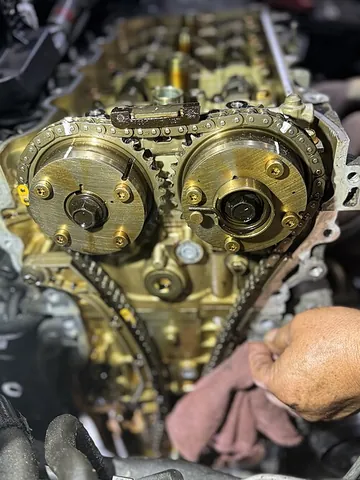 timing chain: a chain (specifically, a roller chain) which connects the crankshaft and the camshaft of an engine,...