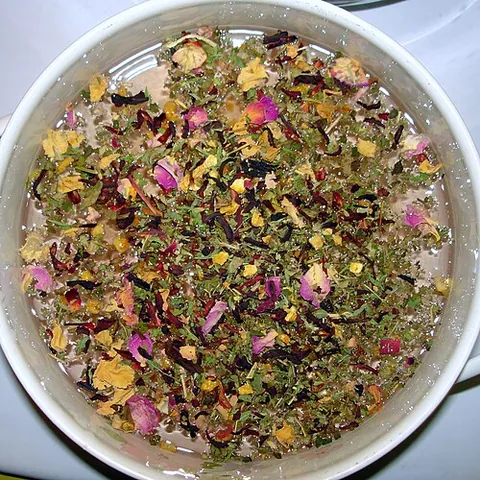tisane: a medicinal drink, originally made from barley soaked in water