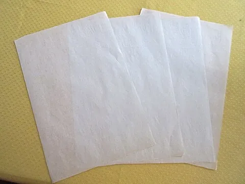 tissue: thin, woven, gauzelike fabric