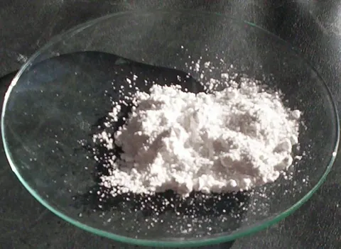 titanium dioxide: a brilliant white powder, TiO₂, used as a pigment, and in sunblock, toothpaste, and cosmetics