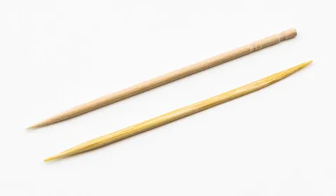 toothpick: a small, usually wooden, stick, often pointed at both ends, for removing food residue from between...
