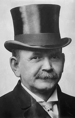 top-hatted: wearing a top hat