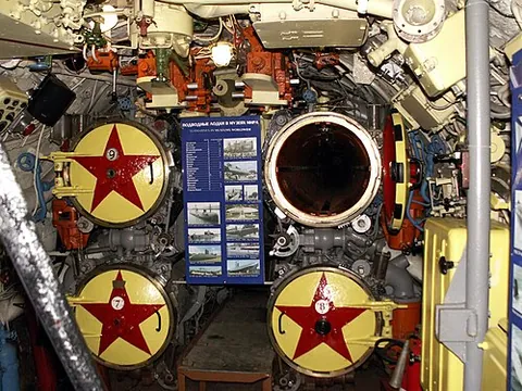 torpedo tube: a metal tube mounted in a submarine or surface warship into which a torpedo may be loaded and...