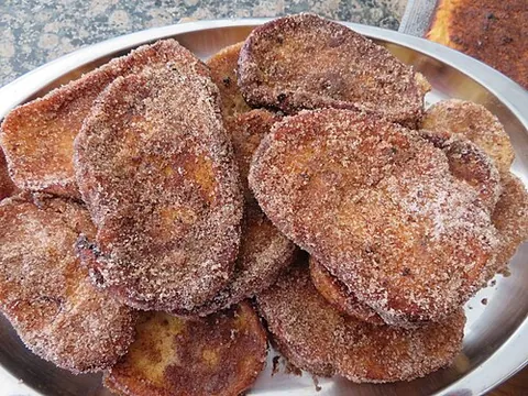 torrija: a traditional Spanish and Latin American variant of French toast, prepared by soaking slices of...