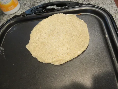 tortilla: a type of Mexican flatbread made out of cornmeal or flour