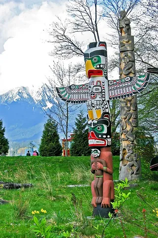 totem pole: a Native American sculpture found in the Pacific Northwest, made by carving trees, and usually...