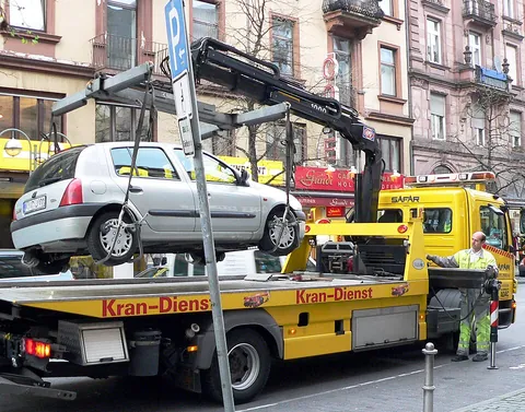 tow truck: a truck (lorry) typically equipped with winches, chains, and related equipment, and used to tow...
