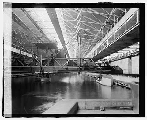 towing tank: a large, elongated indoor pool used in naval architecture and marine engineering to test scale...