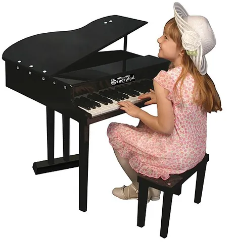 toy piano: a small piano-like musical instrument