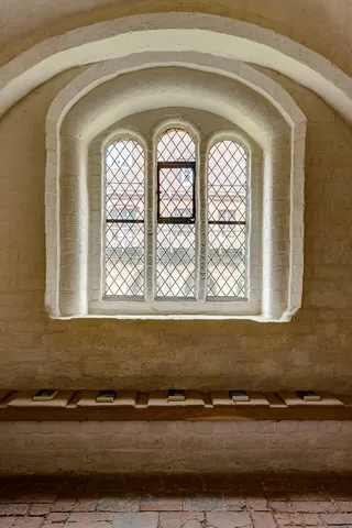 tracery: bars or ribs, usually of stone or wood, or other material, that subdivide an opening or stand in...