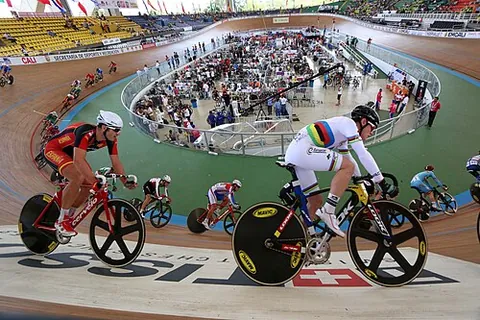 track cycling: a form of cycling on a specially-designed track, especially, a velodrome