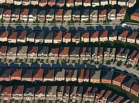 tract house: any of many houses, of a similar or identical plan and design, built on a tract of land