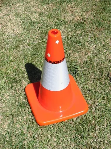 traffic cone: a cone-shaped marker, generally made out of plastic or rubber, that is placed on roads or footpaths...