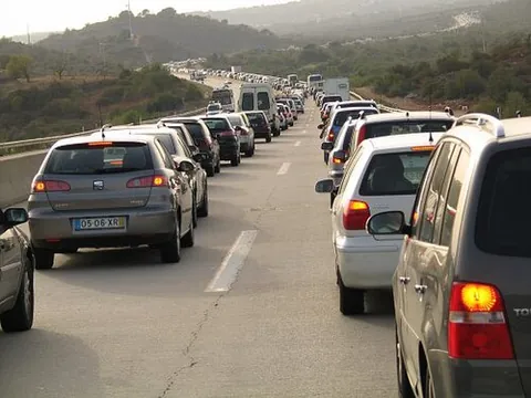traffic jam: a situation in which road traffic accumulates until it is stationary or very slow