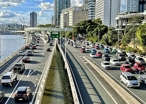 trafficky: characterised by traffic; having the noise and commotion of motor vehicles