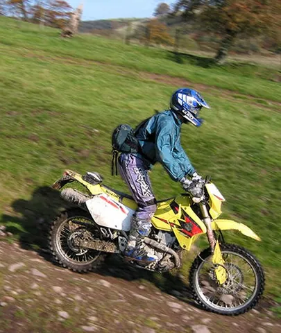 trail bike: a bicycle or motorcycle which is designed and used for off-road travel on rugged or inclined...