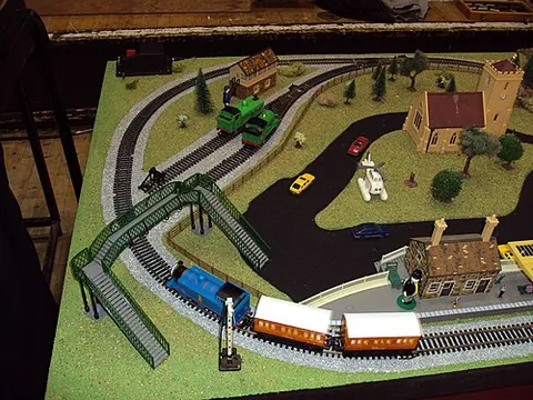 train set: a toy consisting of one or more miniature model trains and the tracks, equipment, scenery, etc....