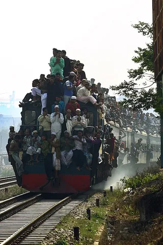 train surfing: riding on the roof, sides or back of a train, sometimes as a form of illegal extreme sport