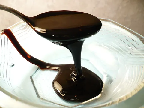 treacle: a syrupy byproduct of sugar refining; molasses or golden syrup