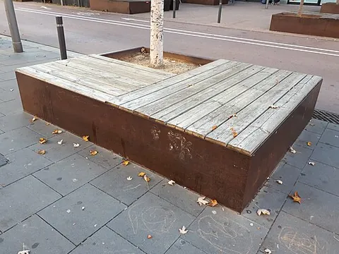 tree seat: a bench placed around a tree