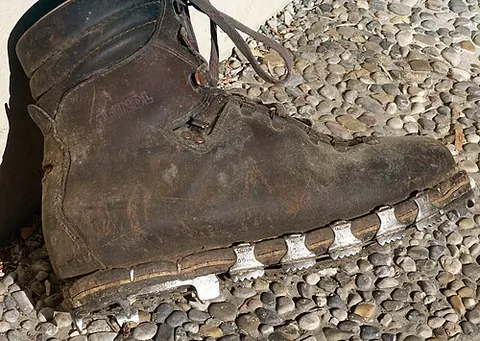 tricouni: a kind of metal nail fixed to the soles of shoes or boots to improve their grip