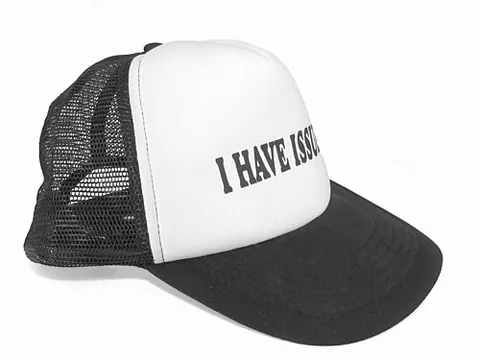 trucker hat: a style of baseball cap with a mesh back and a foam front, typically adorned with a company logo or...