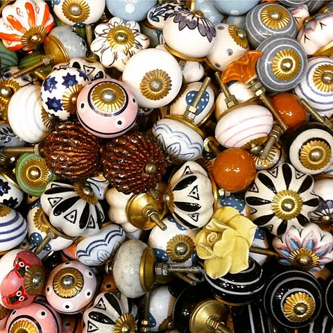trumpery: worthless finery; bric-a-brac or junk