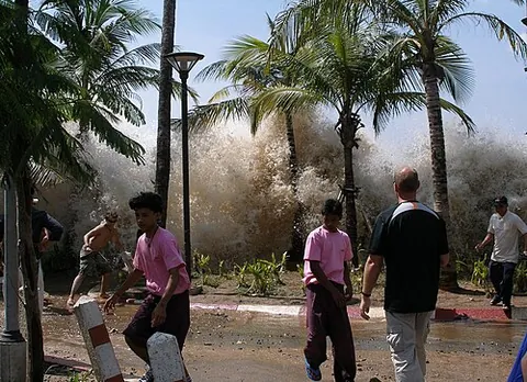 tsunami: a very large and destructive wave, generally caused by a tremendous disturbance in the ocean, such...
