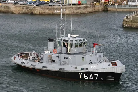 tugboat: a small, powerful boat used to push or pull barges or to help maneuver larger vessels