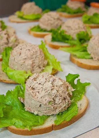 tuna salad: a type of salad consisting of a blend of tuna and mayonnaise, usually pre-cooked, canned, and...
