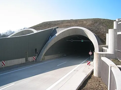 tunnel: an underground or underwater passage