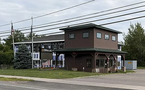 tupper lake: a lake in Franklin County and St. Lawrence County, New York, United States, named after surveyor...