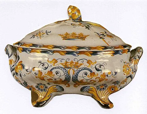 tureen: a broad, deep serving dish used for serving soup or stew